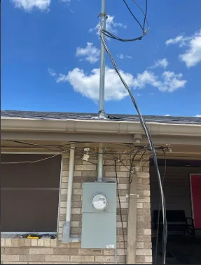 New service mast and meter set for overhead service