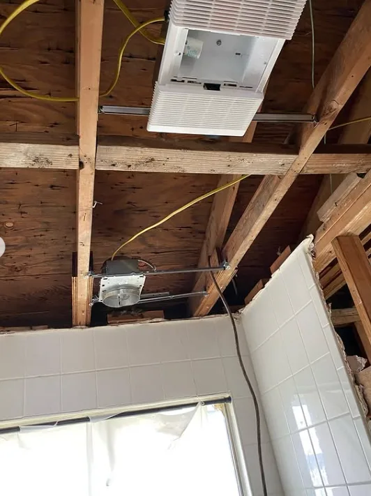 Bathroom exhaust fan and can light rough-in